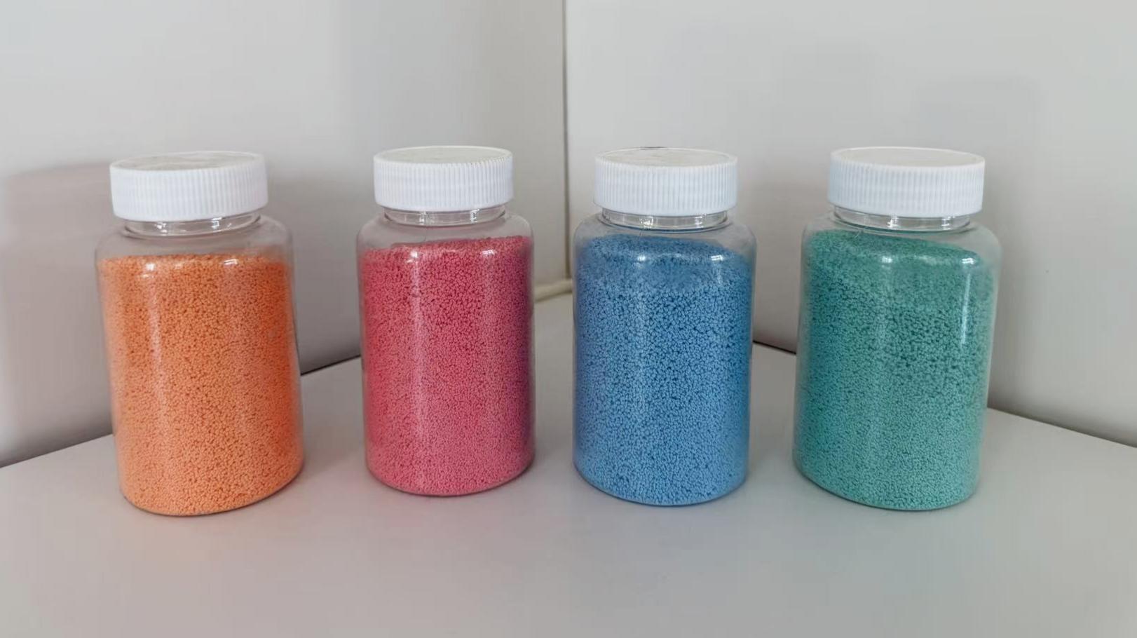 sample bottles of colored speckles